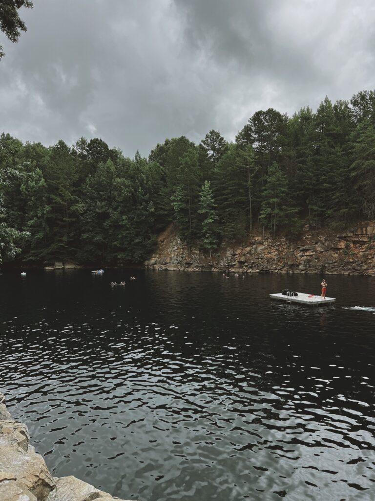 A photo of people swimming in the summer