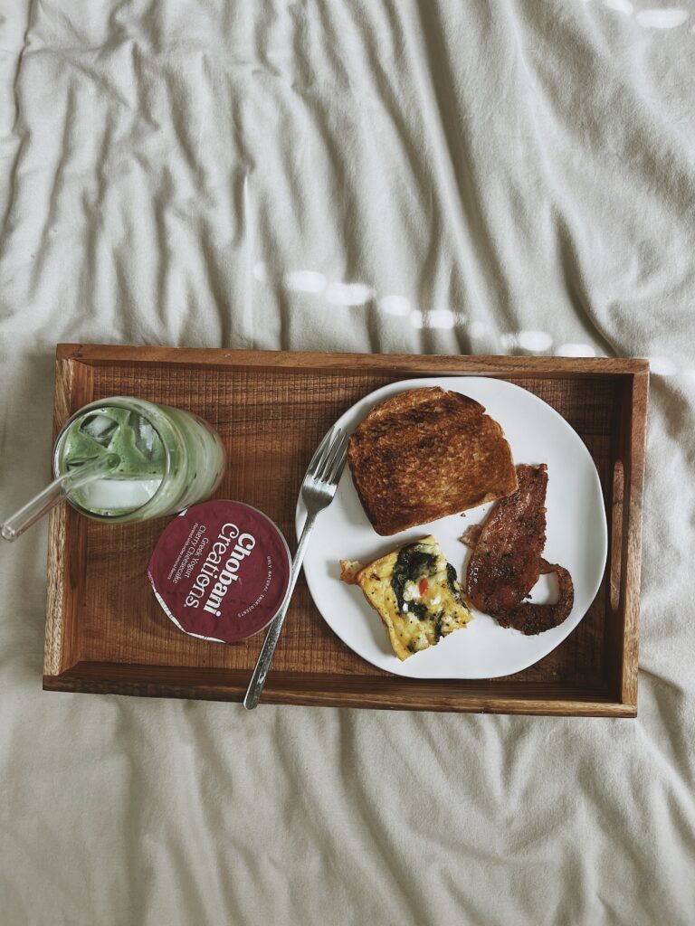 Spinach and Feta Frittata served with breakfast and matcha on a tray.